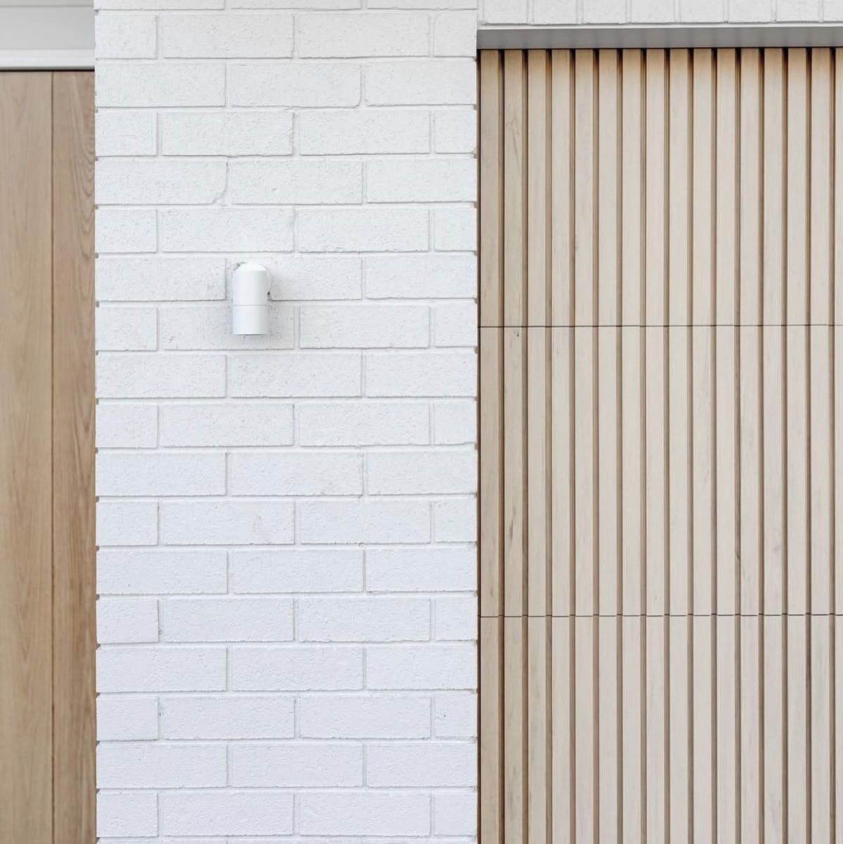 White brick and timber batten detail